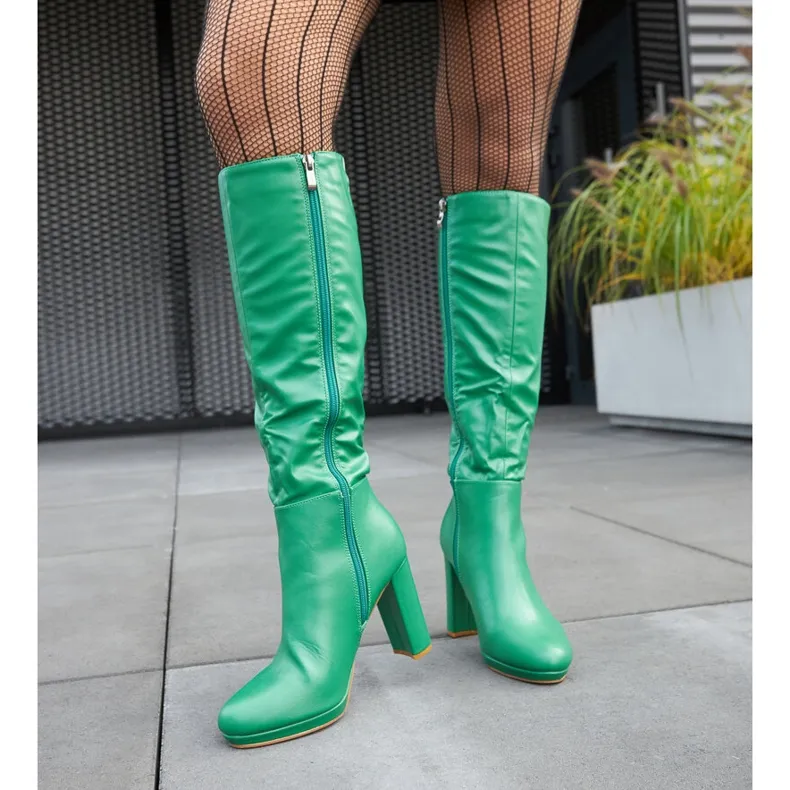 Green high heel boots by Strother