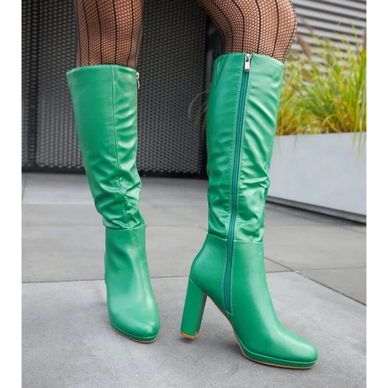 Green high heel boots by Strother