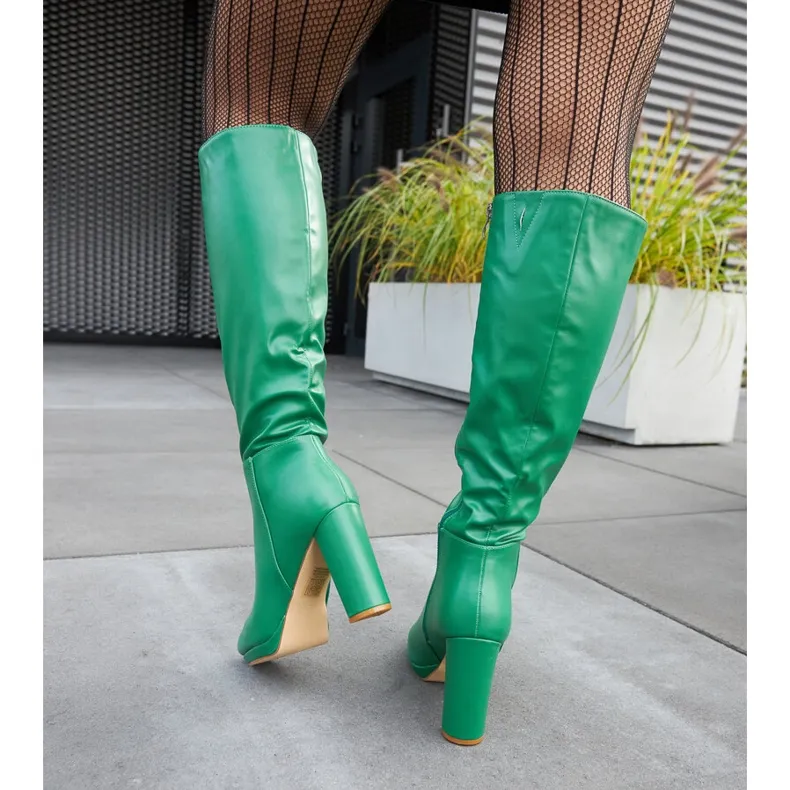 Green high heel boots by Strother