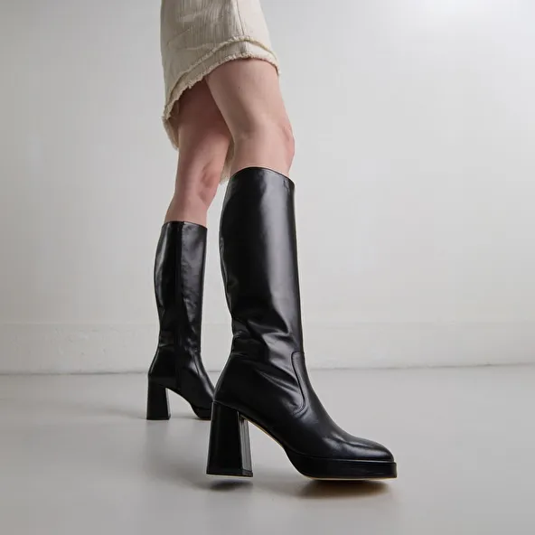 Platform boots in black leather