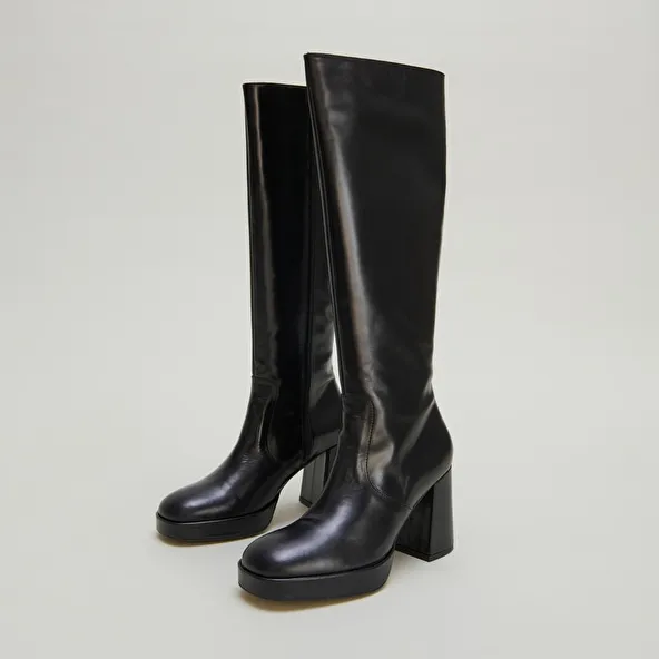 Platform boots in black leather