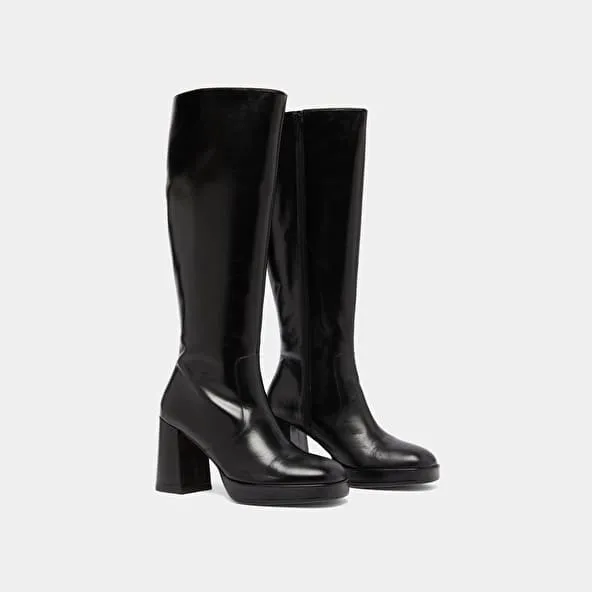 Platform boots in black leather